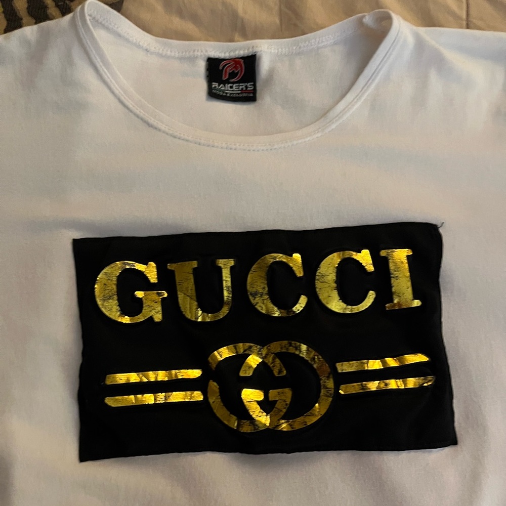 White, soft,short sleeve T-shirt with designer inspired 3 dimensional logo.Sz L